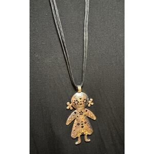 Y51 Silvertone Doll on long black strand necklace